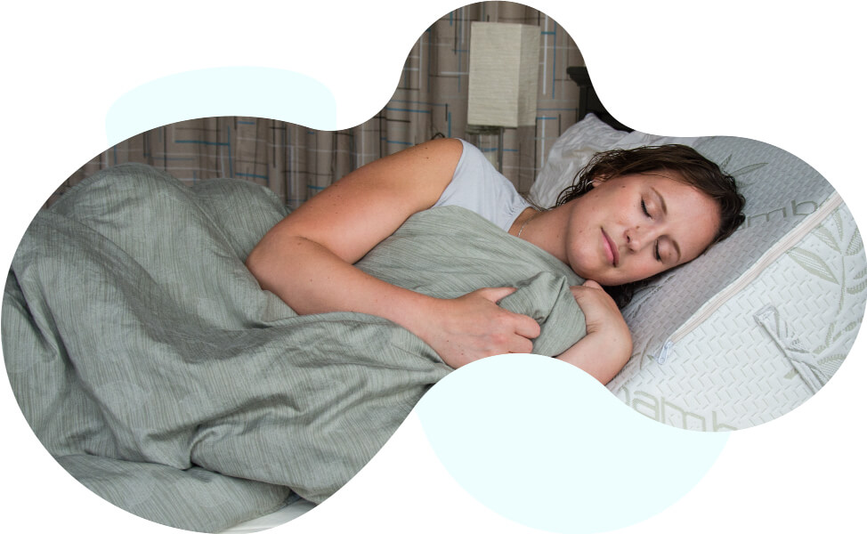 Woman using the Body Buddy as a pillow while she sleeps.